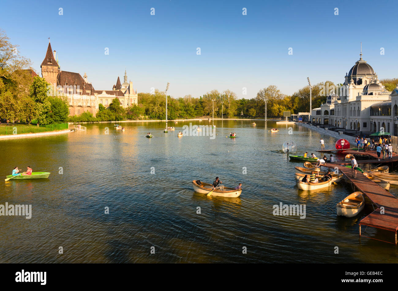 Budapest: City Park (Varosliget), City Park Lake , Vajdahunyad Castle (left), Műjégpálya ( right) and Man at Zorbing, Hungary, B Stock Photo