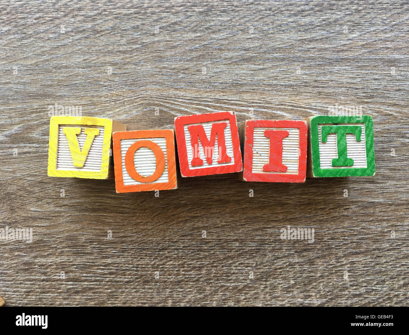 Alphabet Wood Block Letters Forming The Word Vomit Combining Those Toys Letters Help Kids To Learn And Write English Stock Photo Alamy