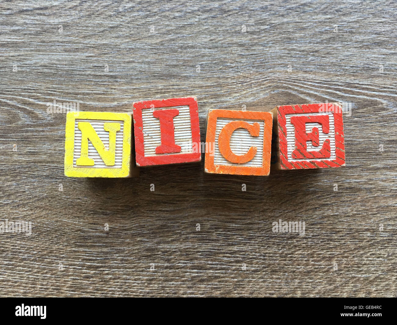 NICE city name written with wood blocks characters Stock Photo