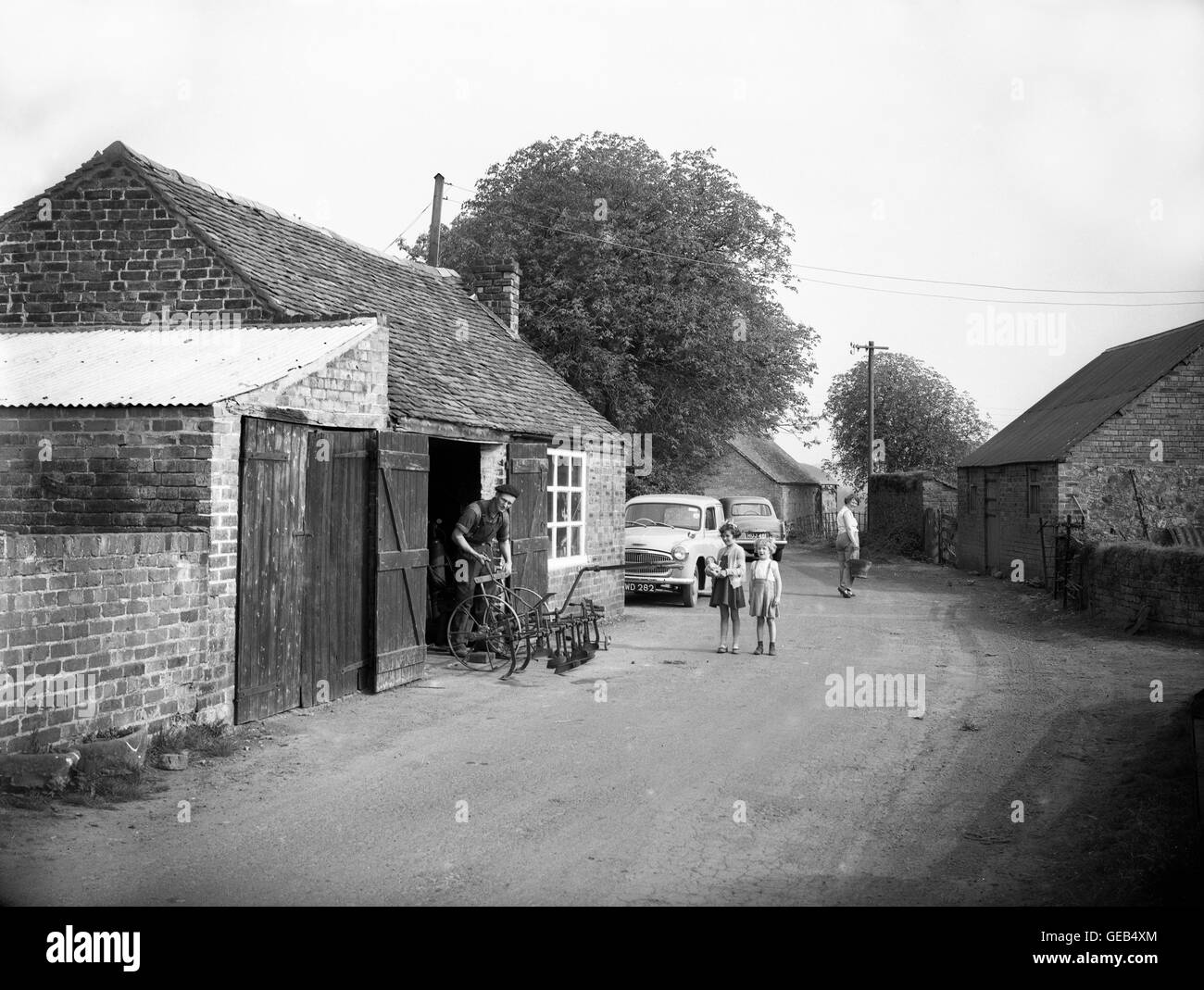 Garmston in Shropshire English village scene 1950s with blacksmiths smithy. Garmston Smithy and blacksmith. Stock Photo