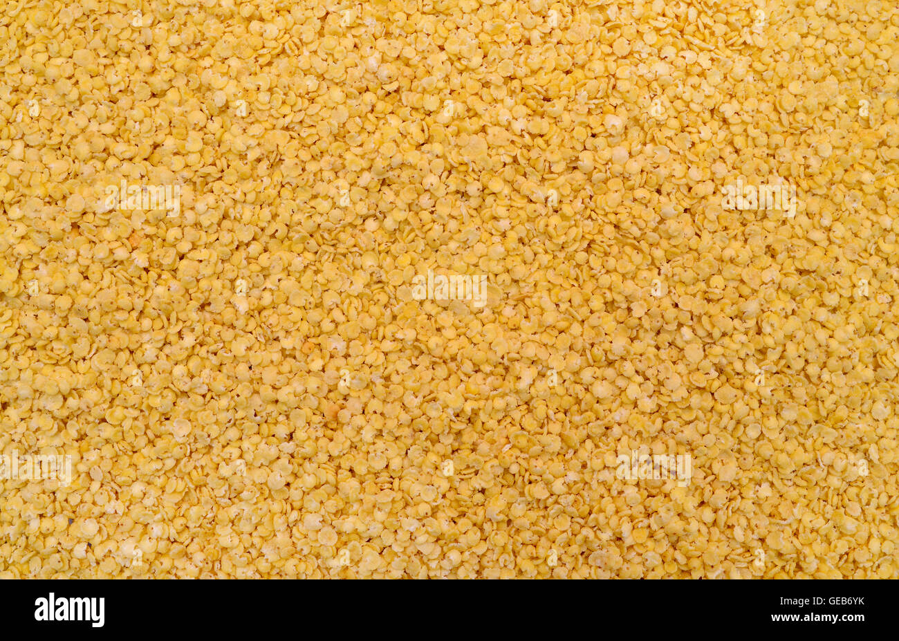 yellow millet cereal flakes texture pattern background Stock Photo Alamy