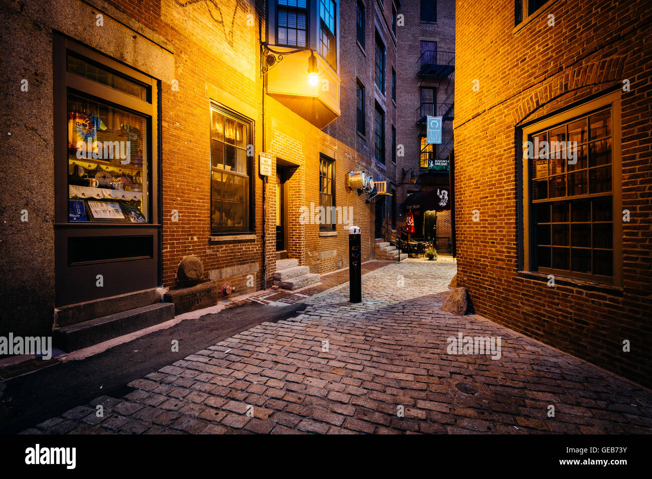A narrow cobblestone alley at night, in Boston, Massachusetts. Stock Photo