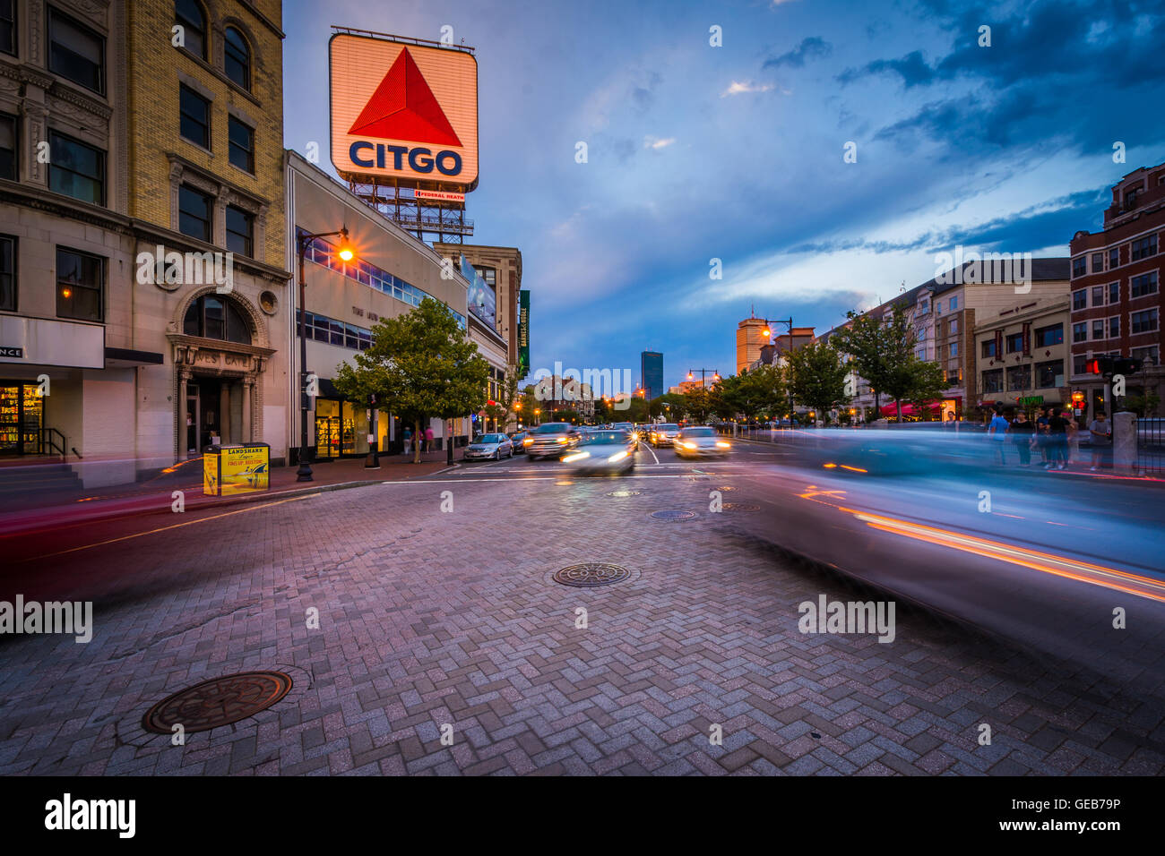 Traffic and the Citgo Sign at Kenmore Square at sunset, in Boston, Massachusetts. Stock Photo