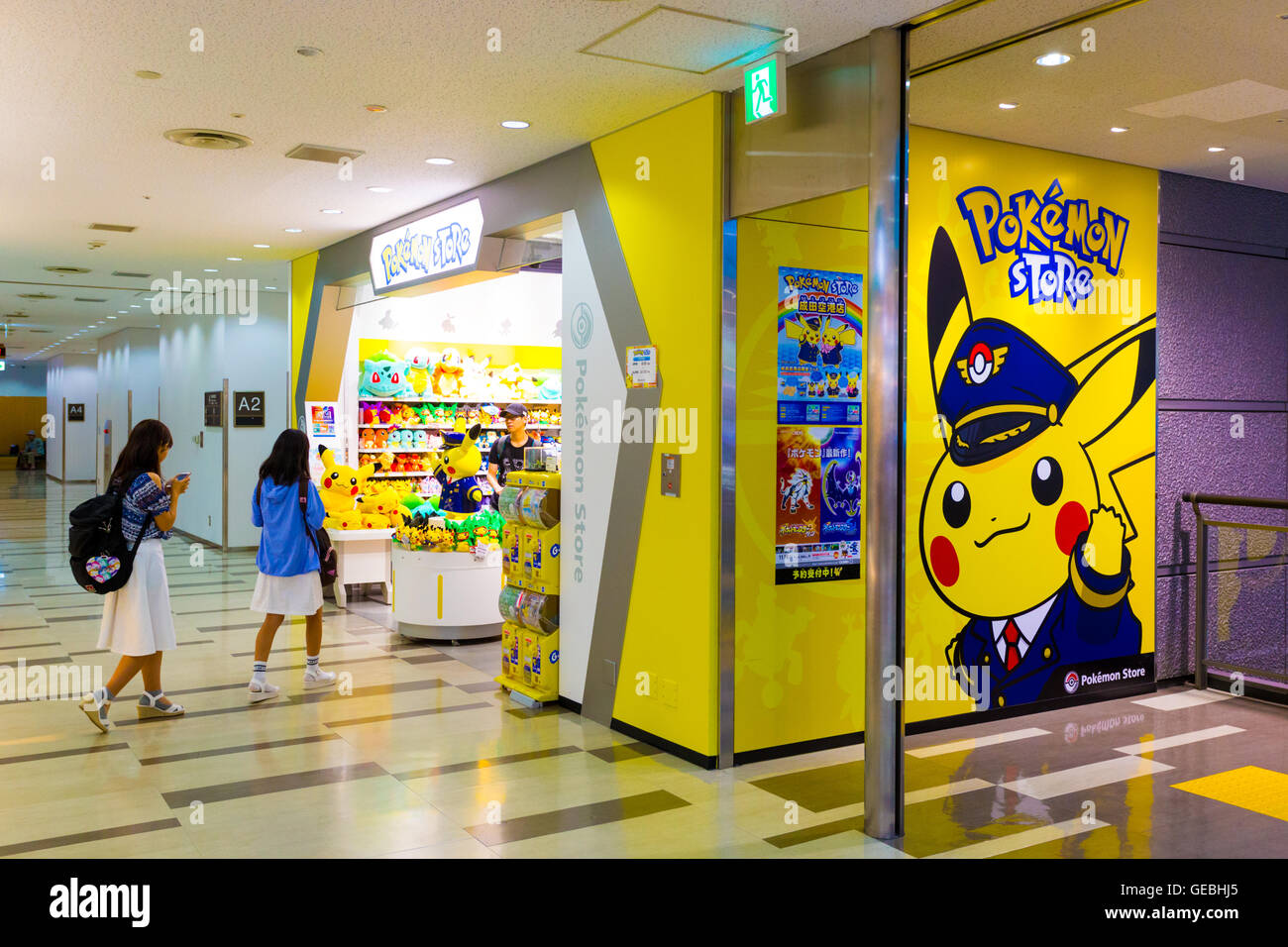 Pikachu Stuffed Dolls Greet Young Asian Girls Walking Into The Narita Airport Pokemon Store Entrance Vertical Stock Photo Alamy