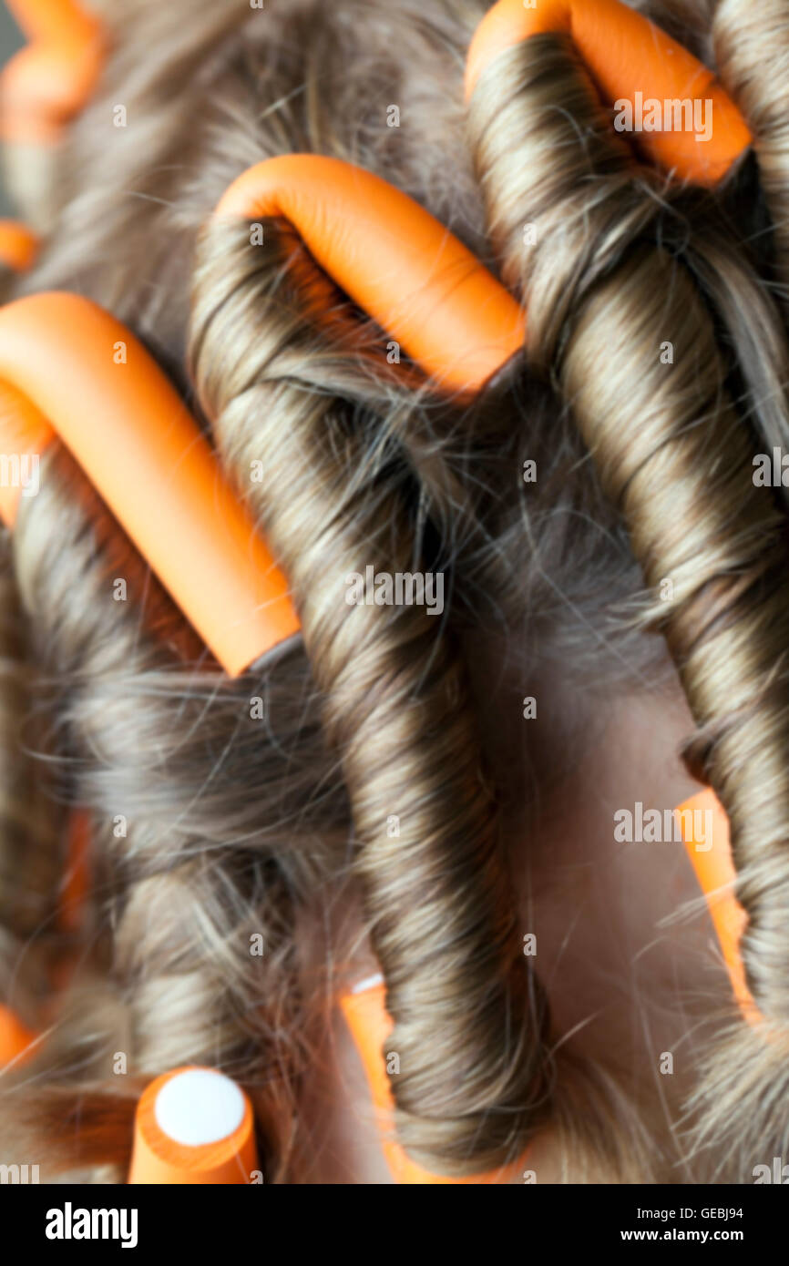 curlers in her hair Stock Photo