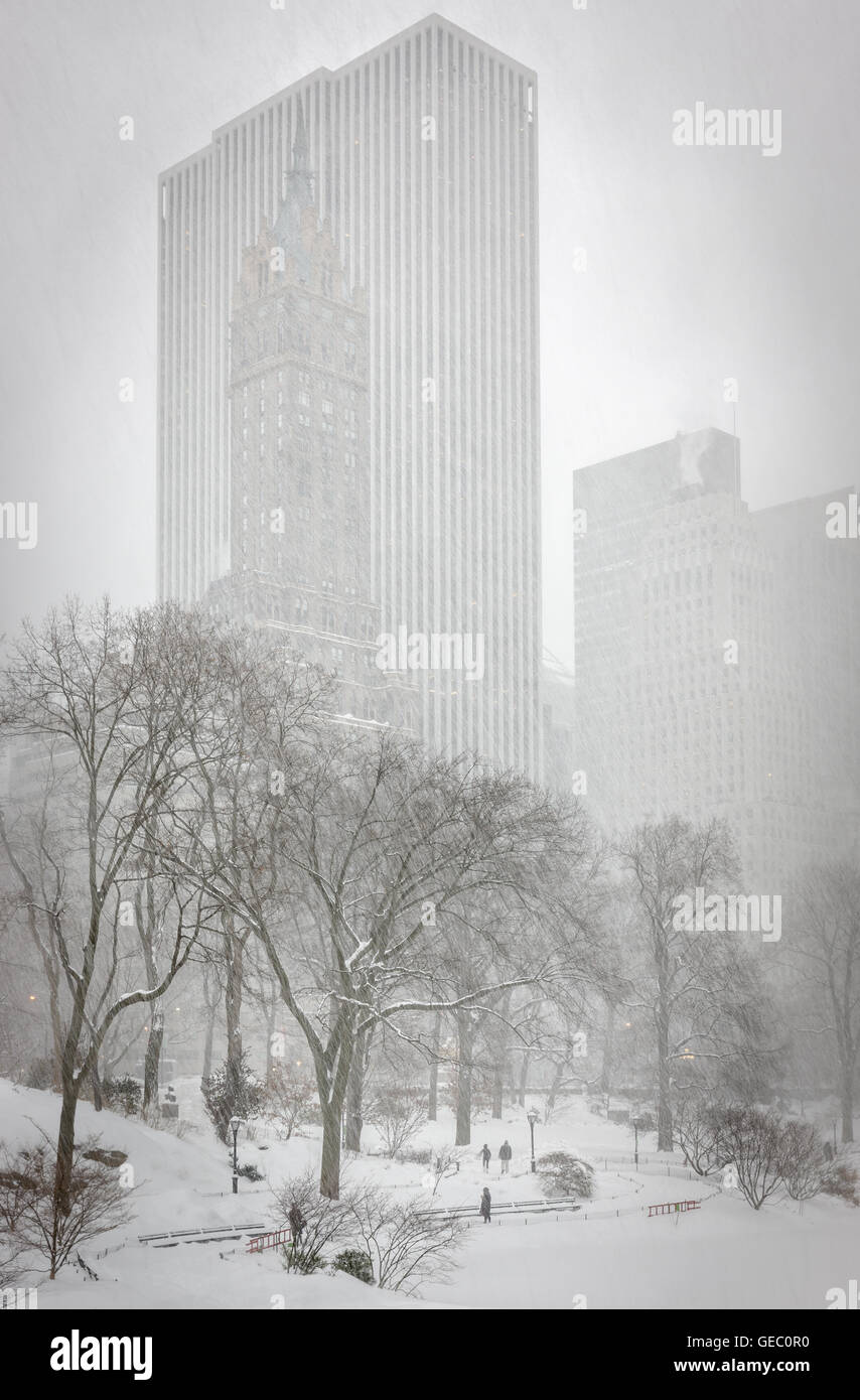 Upper East Side skyscrapers in winter snowfall from Central Park, Manhattan, New York City Stock Photo