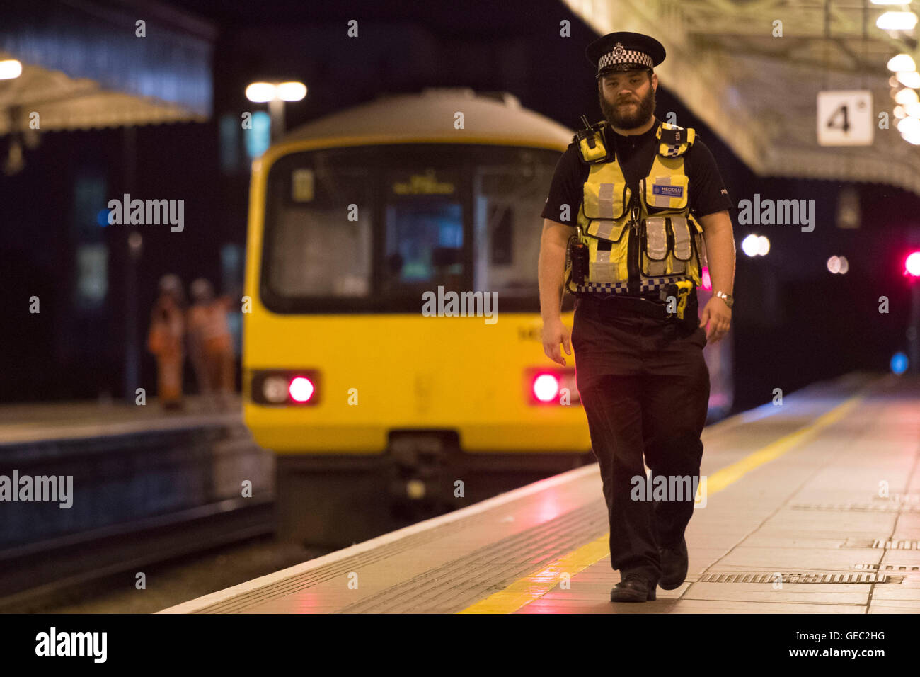British Transport Police (BTP) officer on patrol at Cardiff Central train station. Stock Photo
