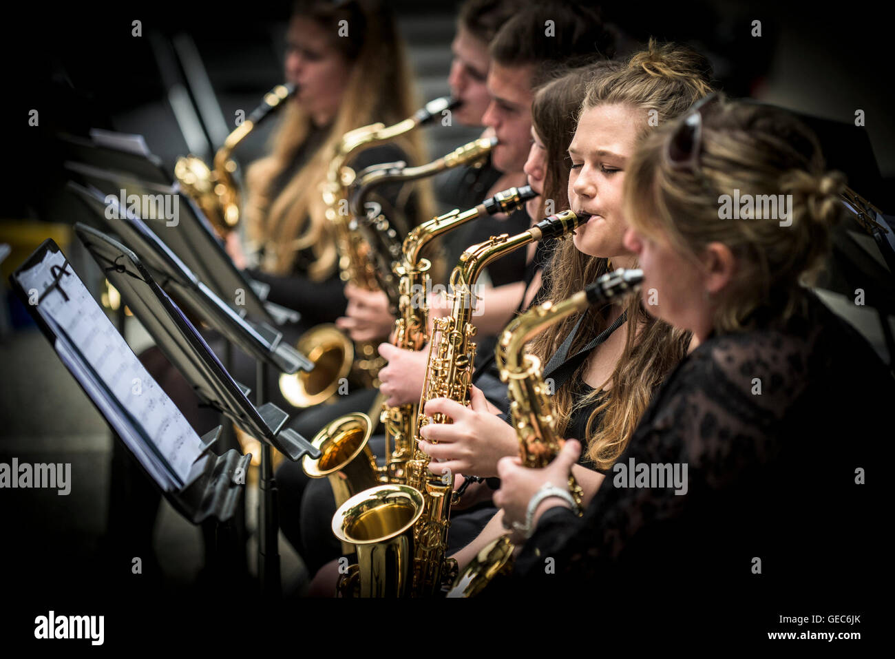 Students from Newquay Tretherras jazz band performing at Trebah Gardens amphitheatre in Cornwall. Stock Photo