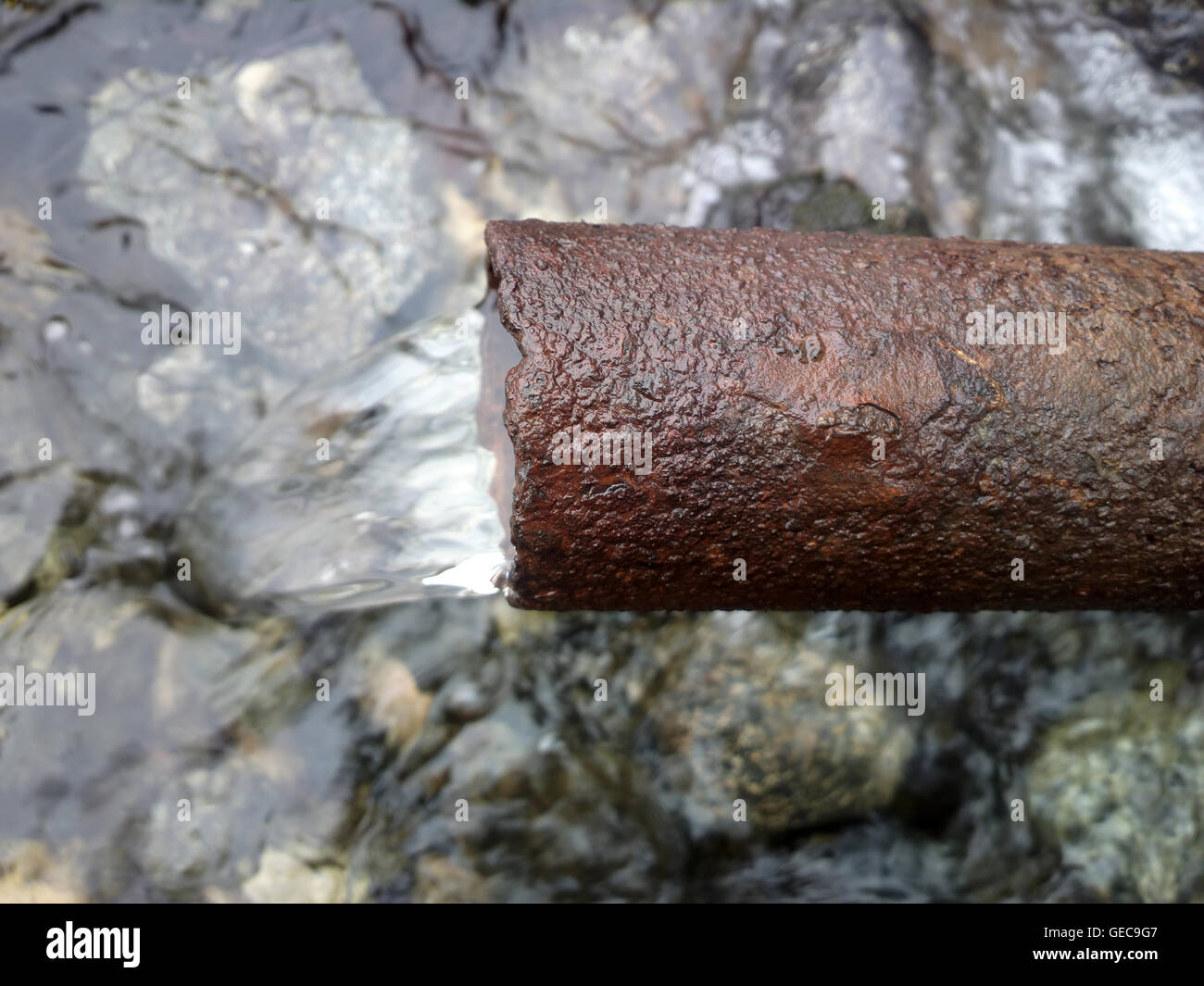 pipe tap nasty rusty with running water Stock Photo Alamy