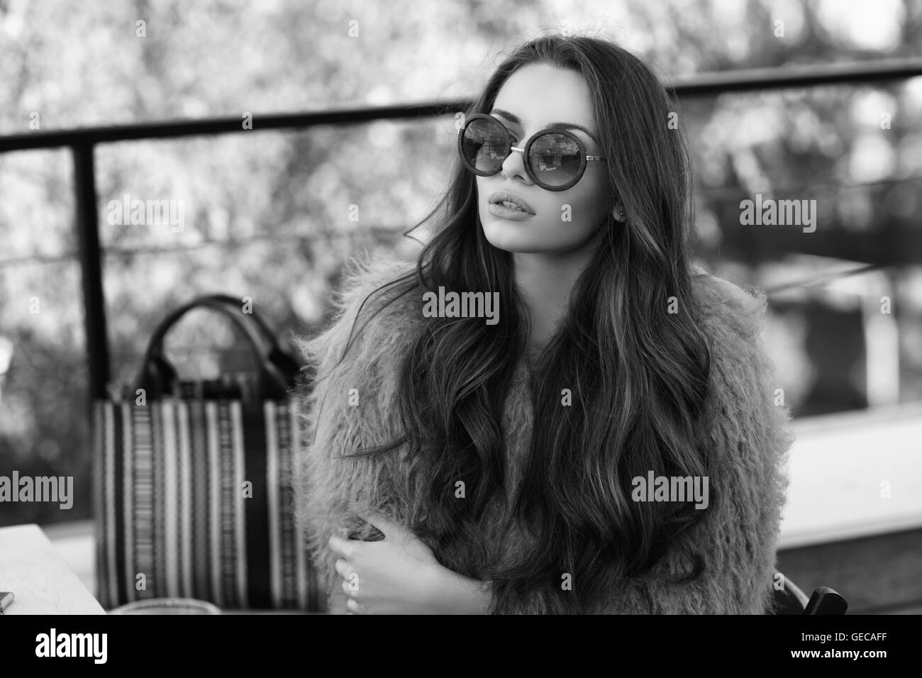 trendy girl in fur coat Stock Photo - Alamy