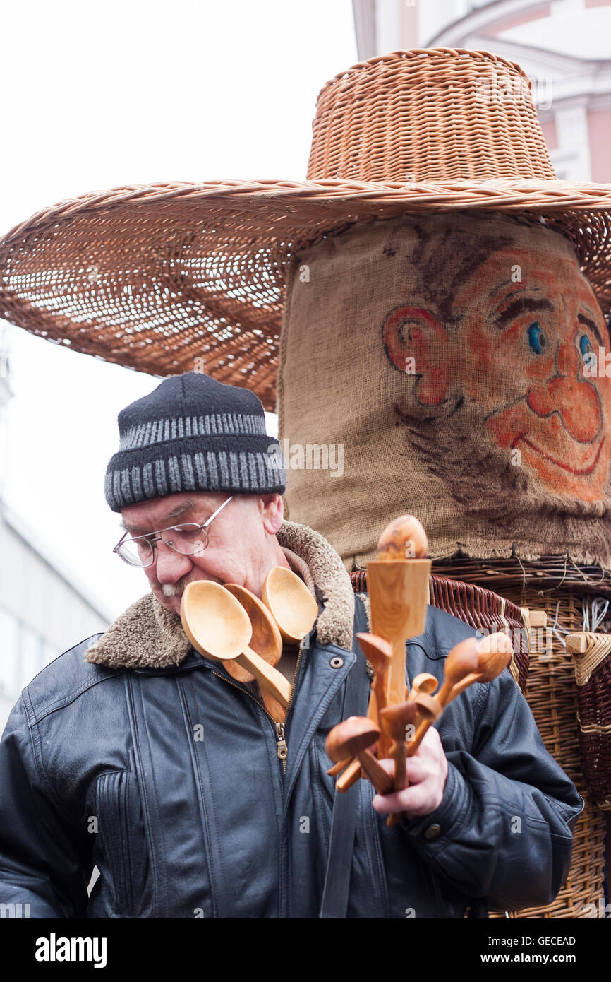 Selling woodend spoonson the street at Kaziuko mugė or Saint Casimir's Fair an annual festival in November in Vilnius Lithuania Stock Photo