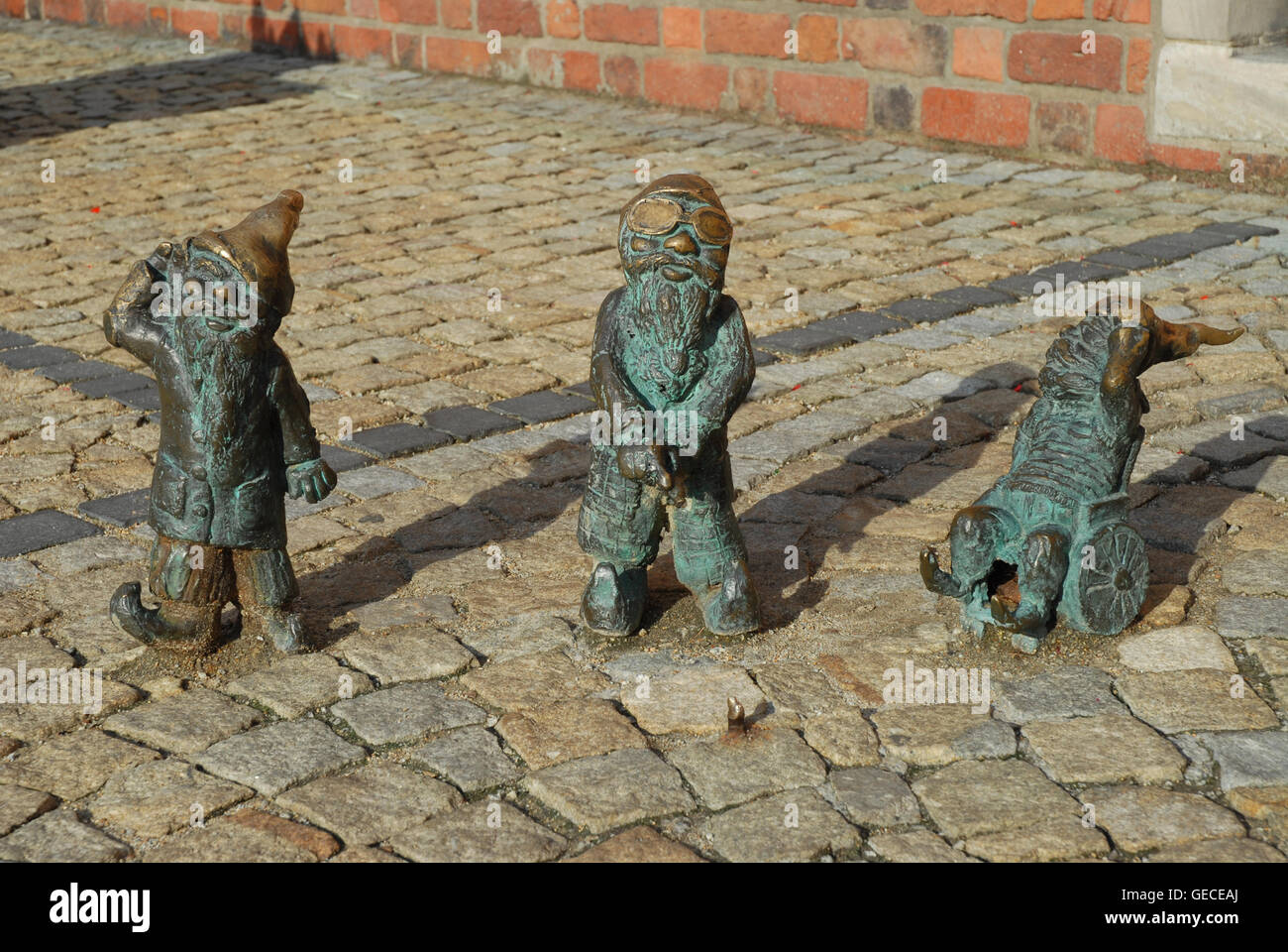 One of Wrocław’s most popular and iconic attractions - a dwarf  trio- unlikely symbol of one of Poland's most picturesque citie. Stock Photo