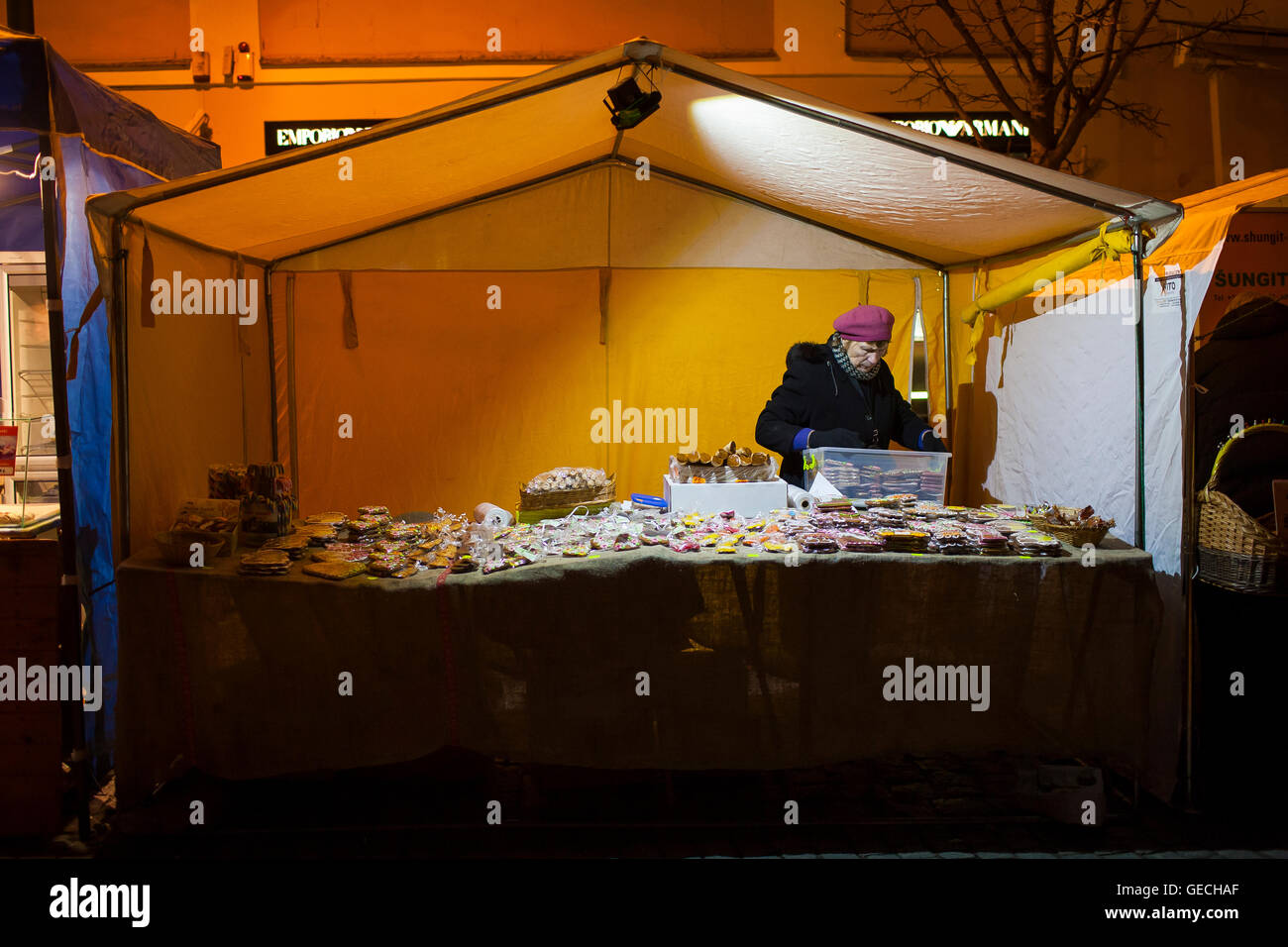 Food stall in the evening at Kaziuko mugė or Saint Casimir's Fair an annual festival in November in Lithuanian city of Vilnius Stock Photo