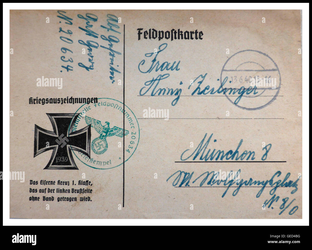 German field post card WW2 1940 with iron cross medal first class motif addressed to a lady in Munich Germany Stock Photo