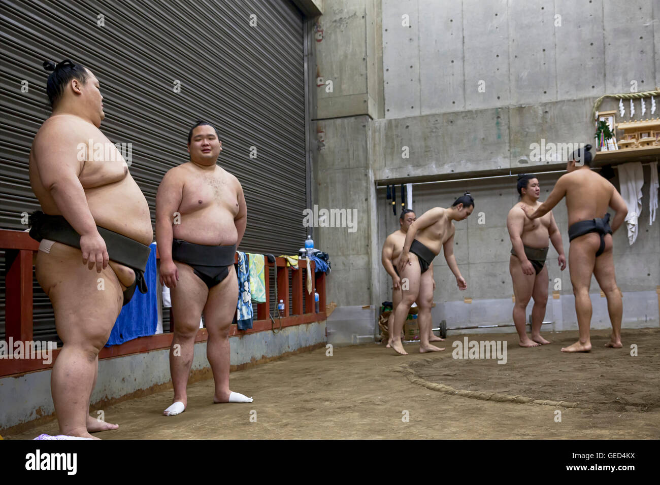 TOKYO, JAPAN - May 18, 2016: Japanese sumo wrestler training in their stall in Tokyo Stock Photo