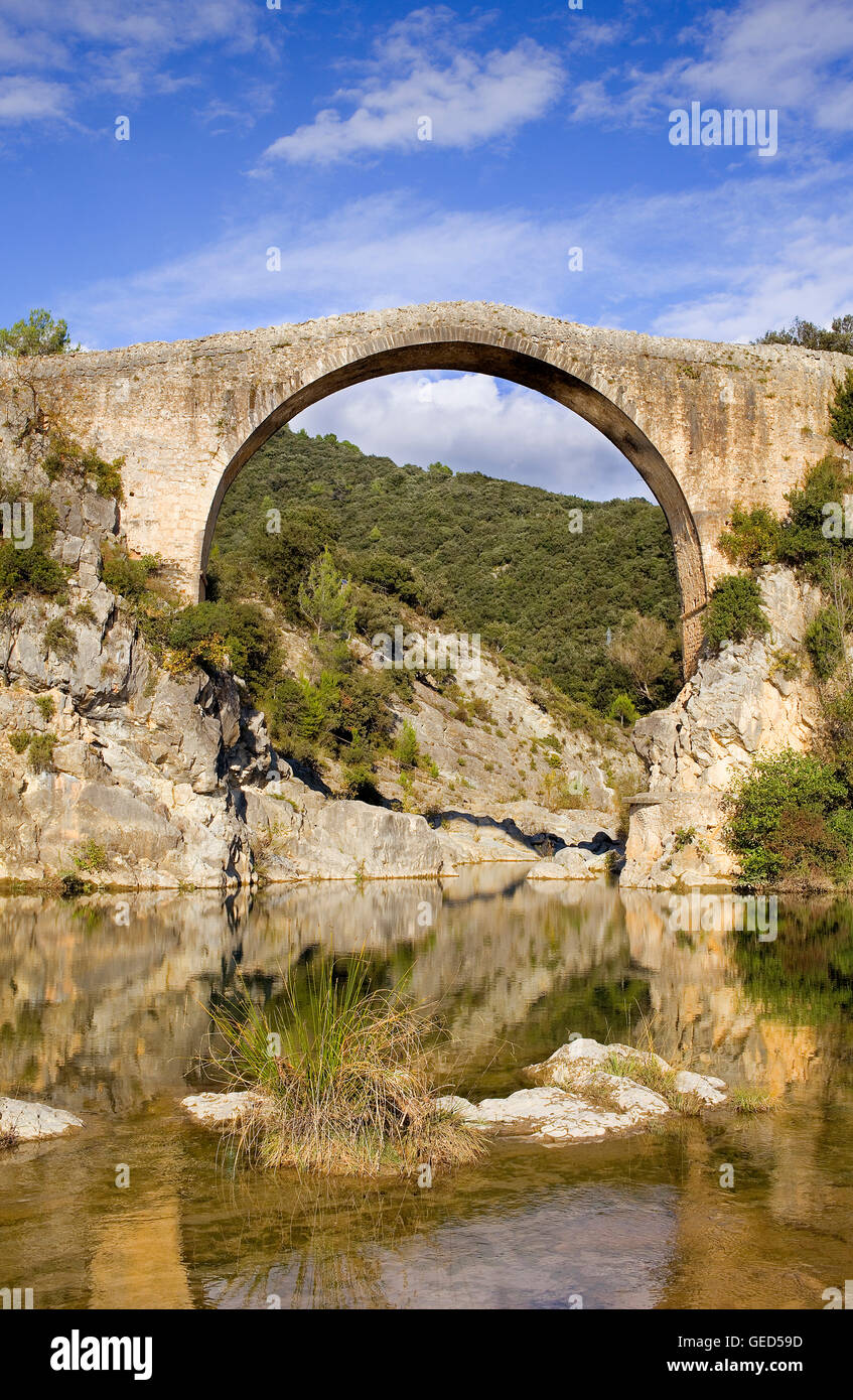 Llierca Bridge over Llierca River - 14th Century -, between Sadernes and Montagut villages, La Garrotxa, Girona, Spain Stock Photo