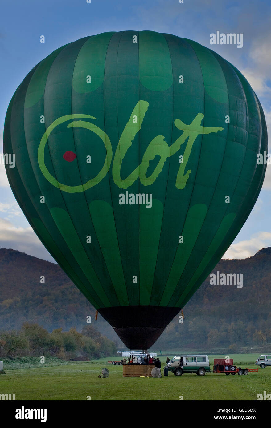 Hot air balloon preparing for flight over Garrotxa Natural Park,Girona province. Catalonia. Spain Stock Photo