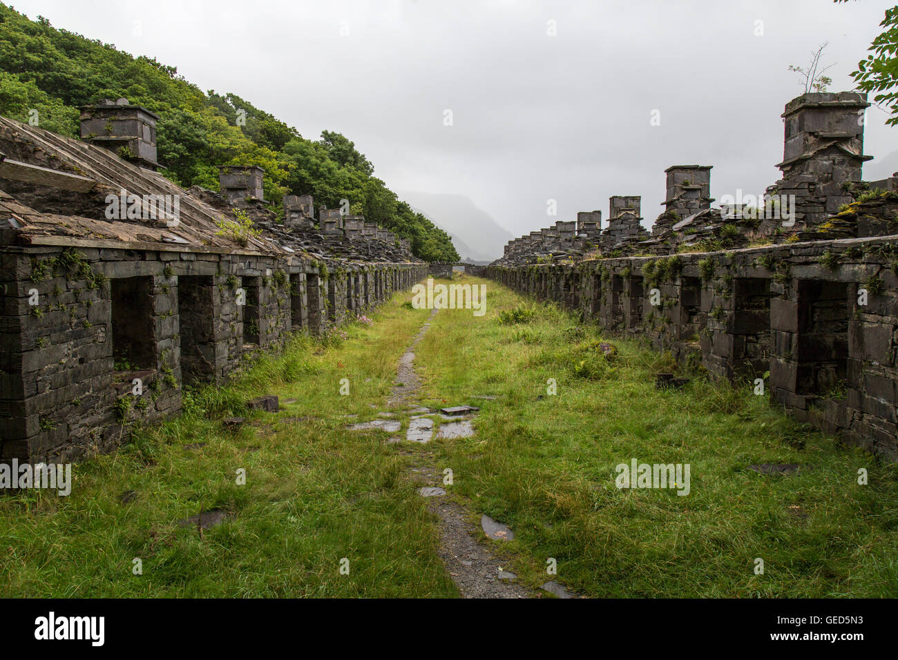Abandoned buildings above the disused Dinorwic Slate quarry in Llanberis, North Wales. Now part of the National Slate Museum. Stock Photo
