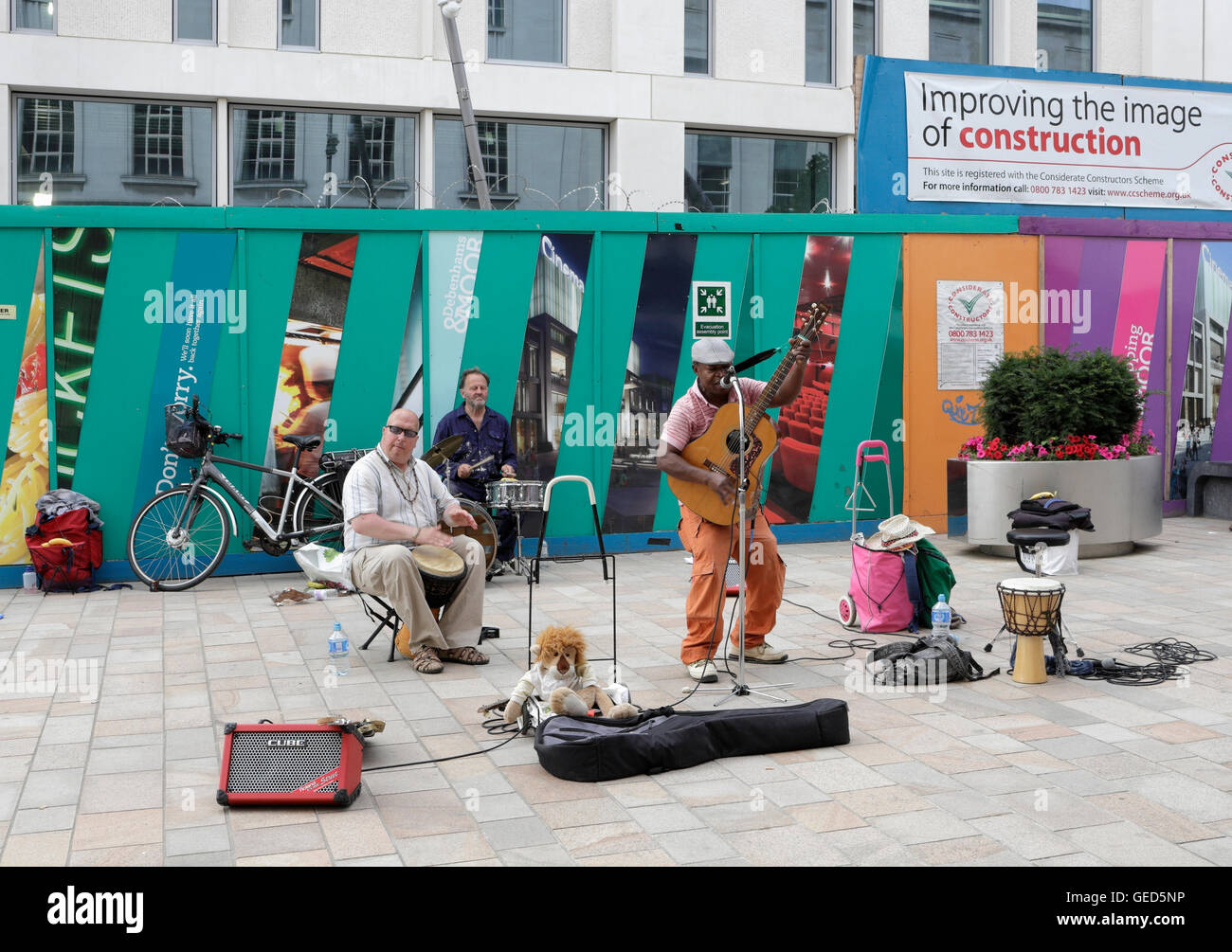 People Street Busking on the Moor Sheffield city centre England Stock Photo