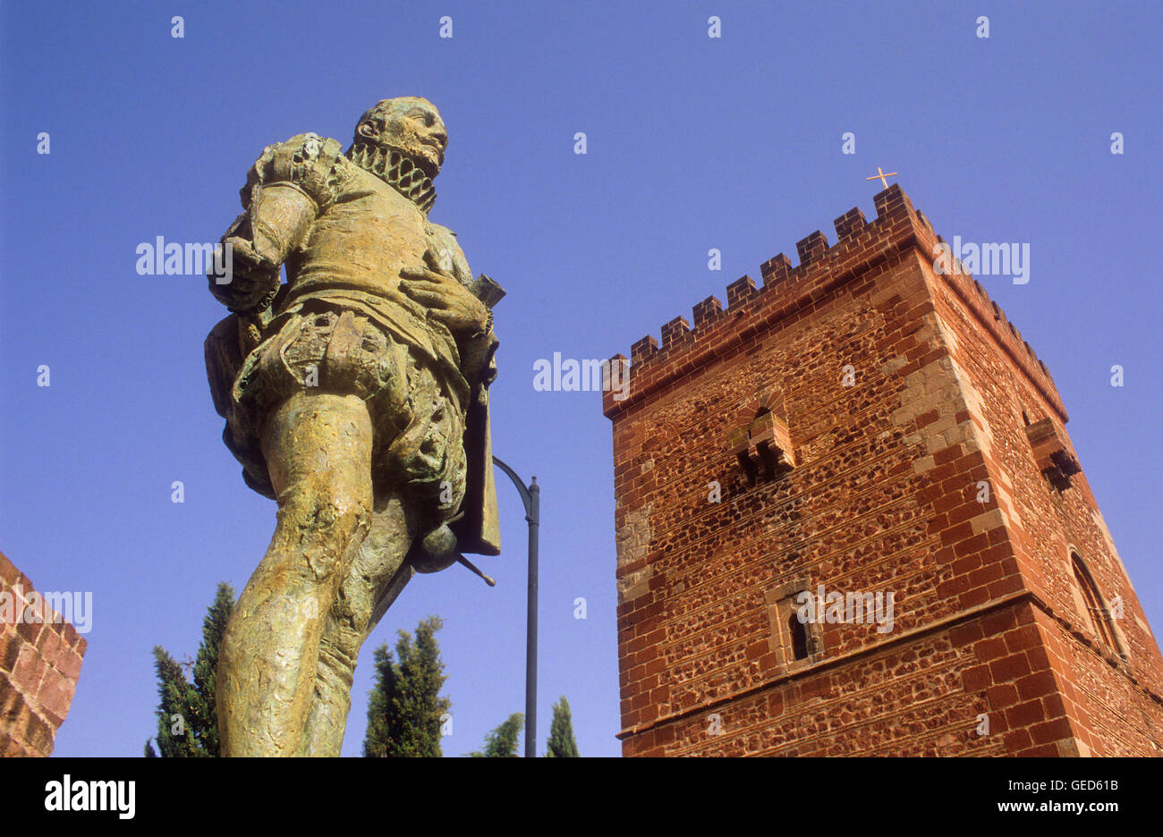 Miguel de Cervantes Saavedra Monument and Don Juan de Austria fortified tower or `Torreon del Prior´,Alcazar de San Juan, Ciu Stock Photo