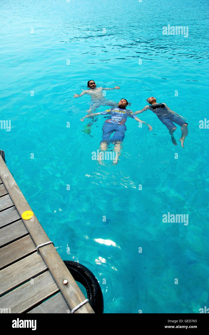 Swimming in the ocean Stock Photo