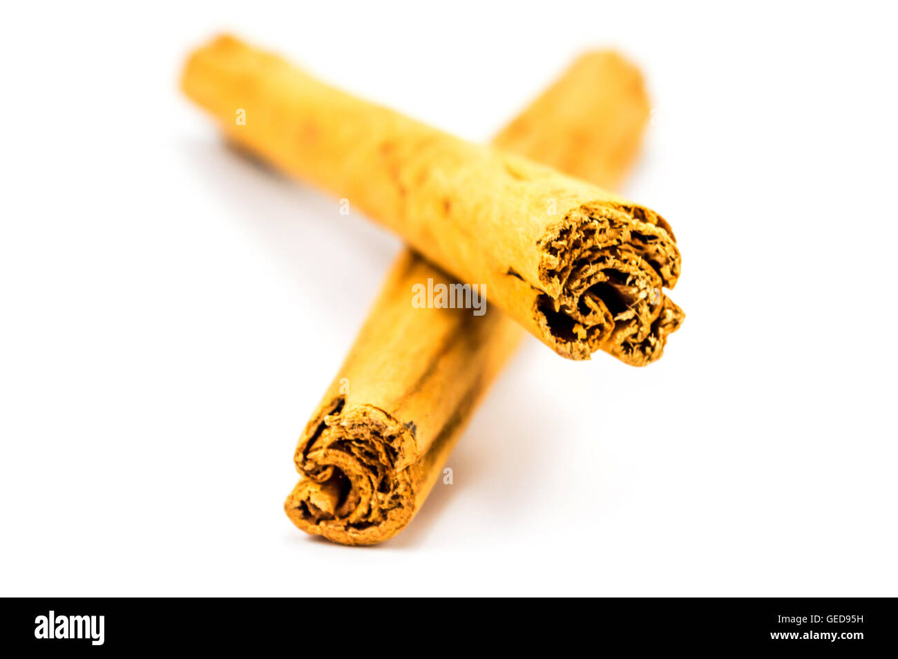 Cinnamon Sticks on white Stock Photo Alamy