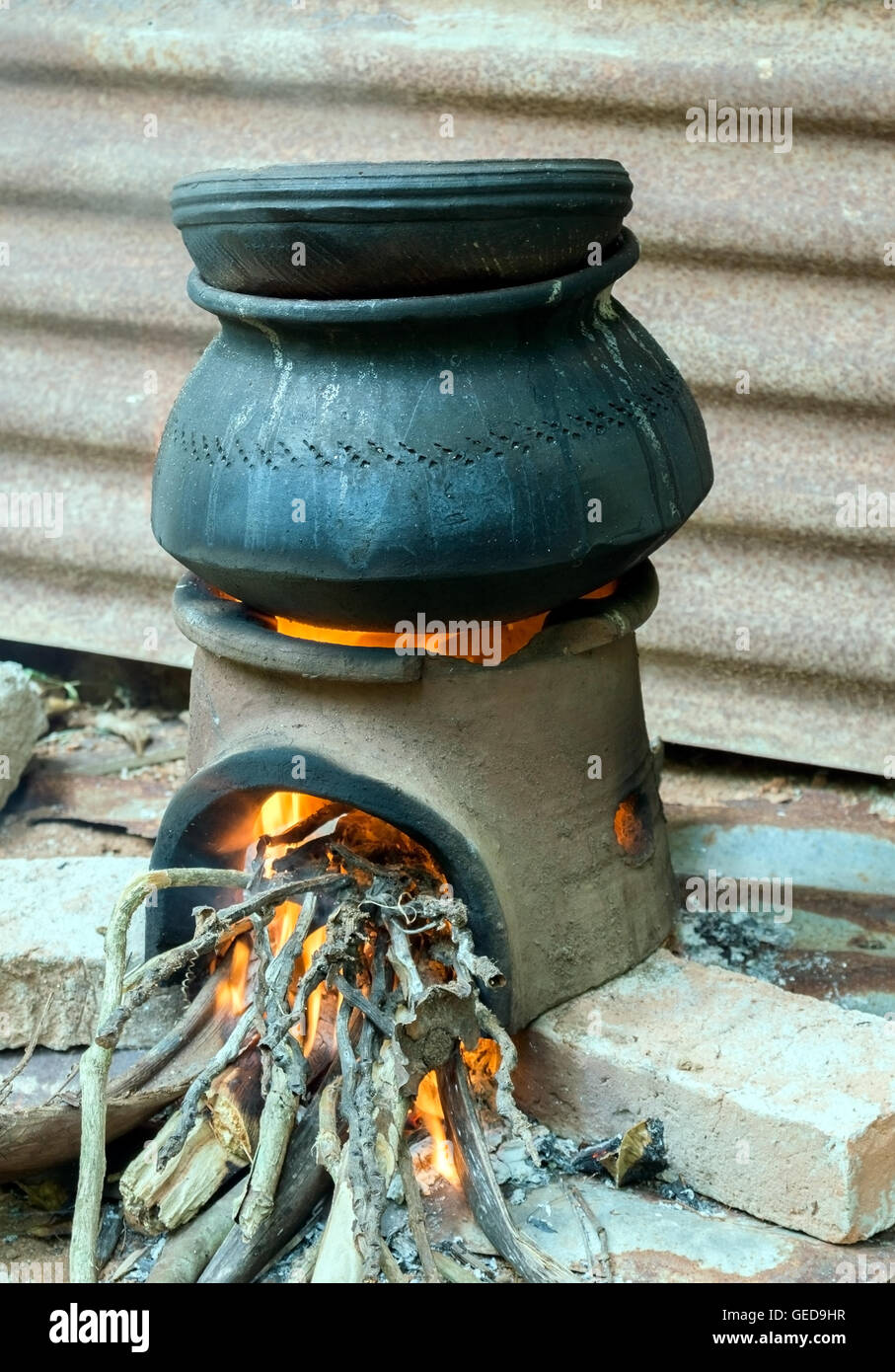 Cooking in the traditional hearth Stock Photo Alamy