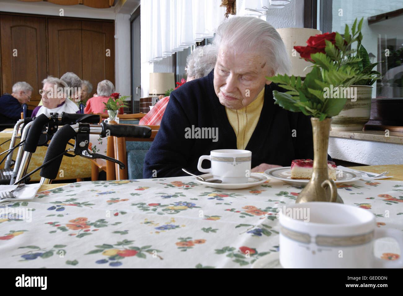 Residents drinking coffee, tea time at a nursing time Stock Photo