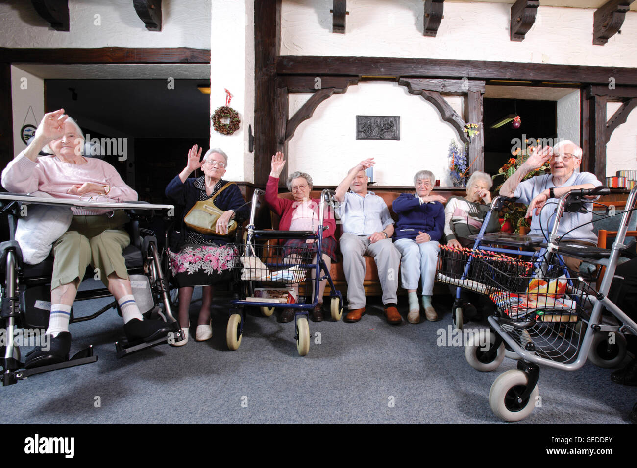 Residents in the common room of a nursing home Stock Photo