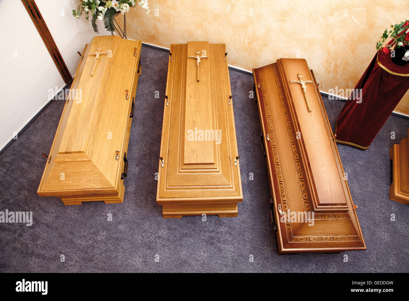 Wooden coffins on display in a showroom, show room Stock Photo