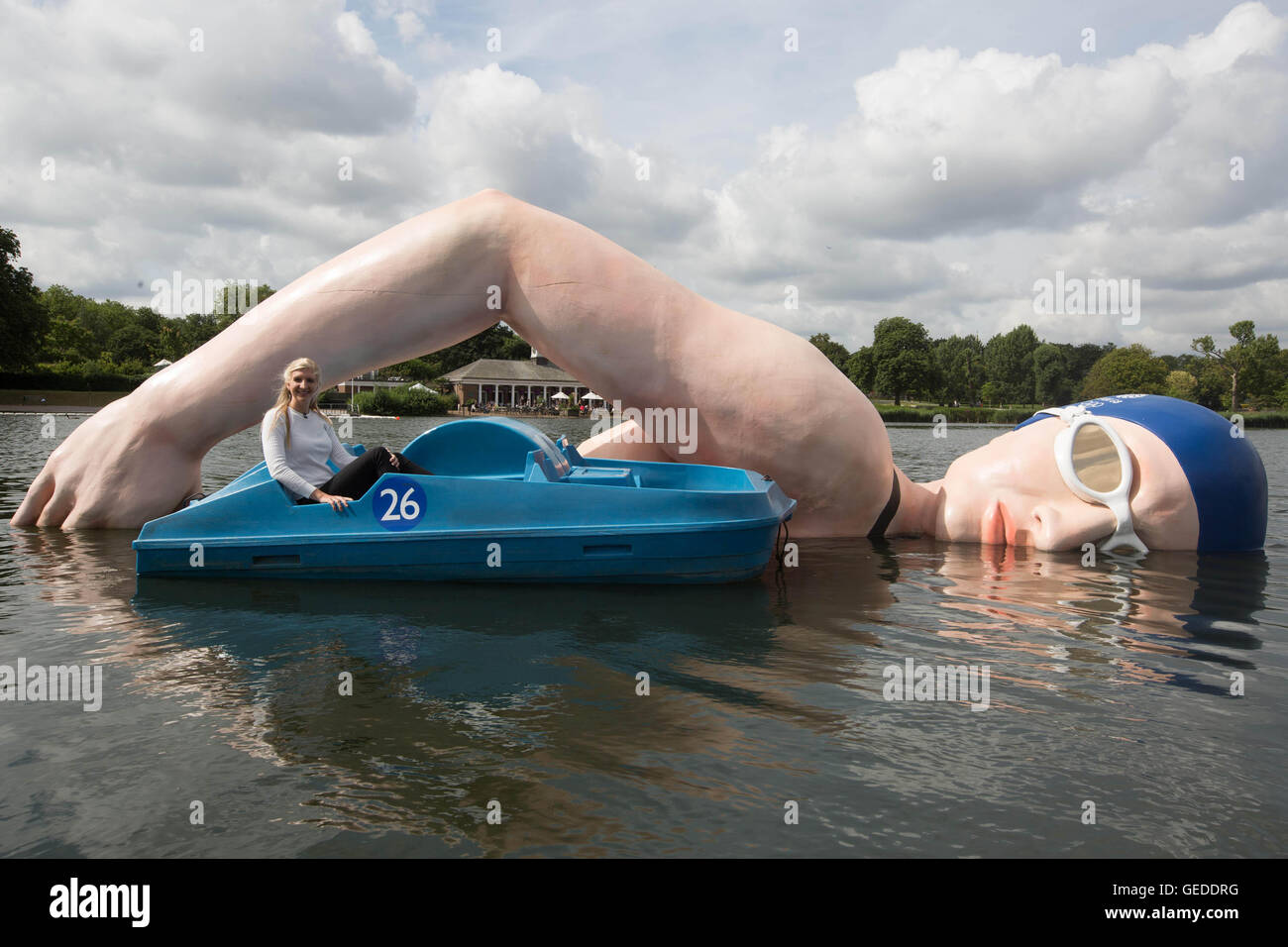 EDITORIAL USE ONLY Rebecca Adlington with a 12ft x 40ft sculpture of the British swimming champion after it was unveiled in The Serpentine in London&Atilde;&shy;s Hyde Park, as part of the Kellogg&Atilde;&shy;s #GreatStarts Olympic campaign, to encourage the public to support Team GB at Rio 2016 Olympics. Stock Photo