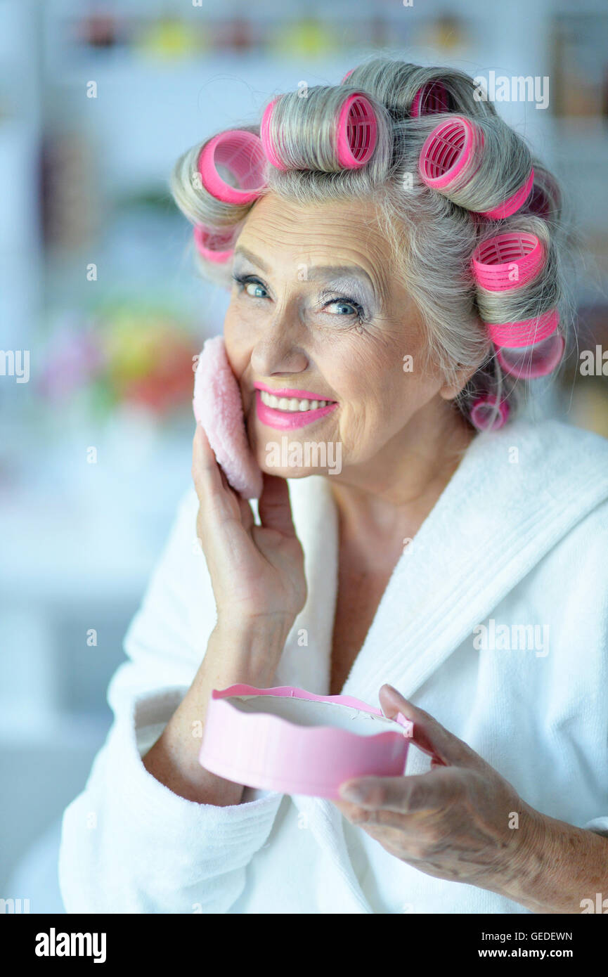 Senior woman in hair rollers Stock Photo Alamy