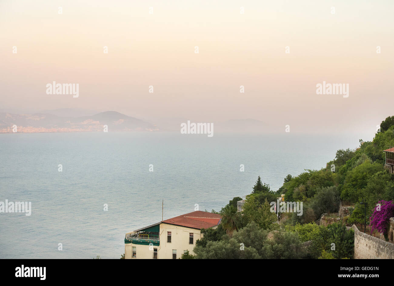 Sea view from the Castle hill at sunset. The Old city of Alanya, Turkey Stock Photo