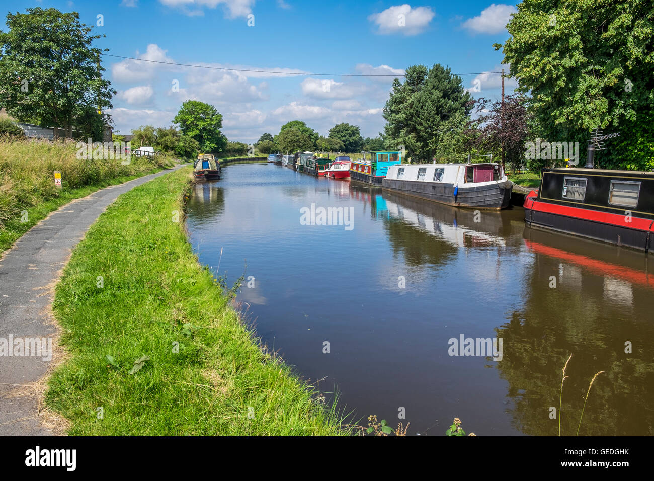 Narrow boats moored up on the Leeds/Liverpool Canal Near to Chorley, Lancashire Stock Photo