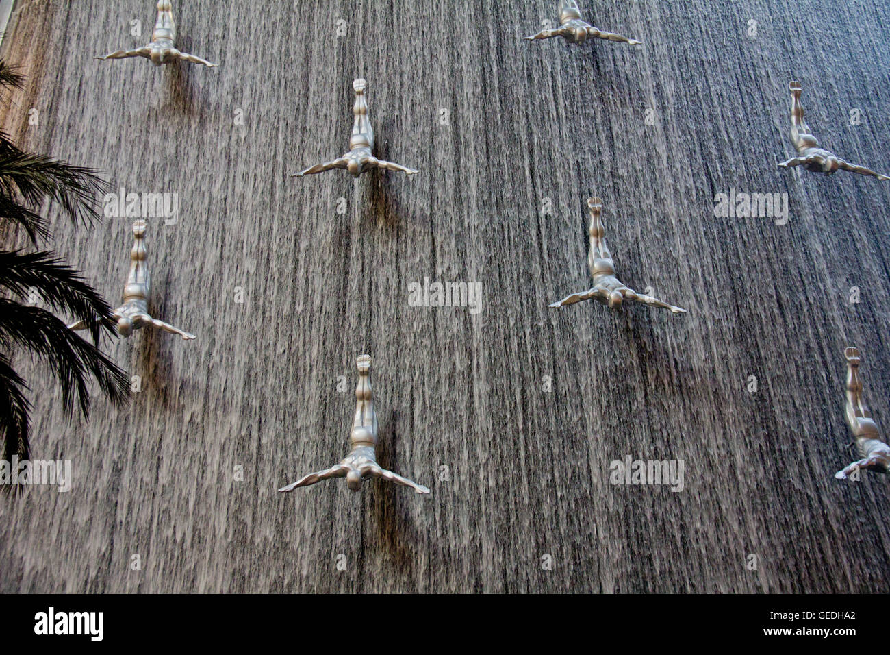 Sculpture diving men in Dubai mall Stock Photo Alamy