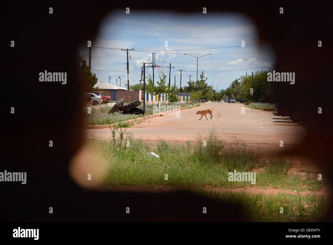 A hole in the international border wall between Naco, Arizona, USA and