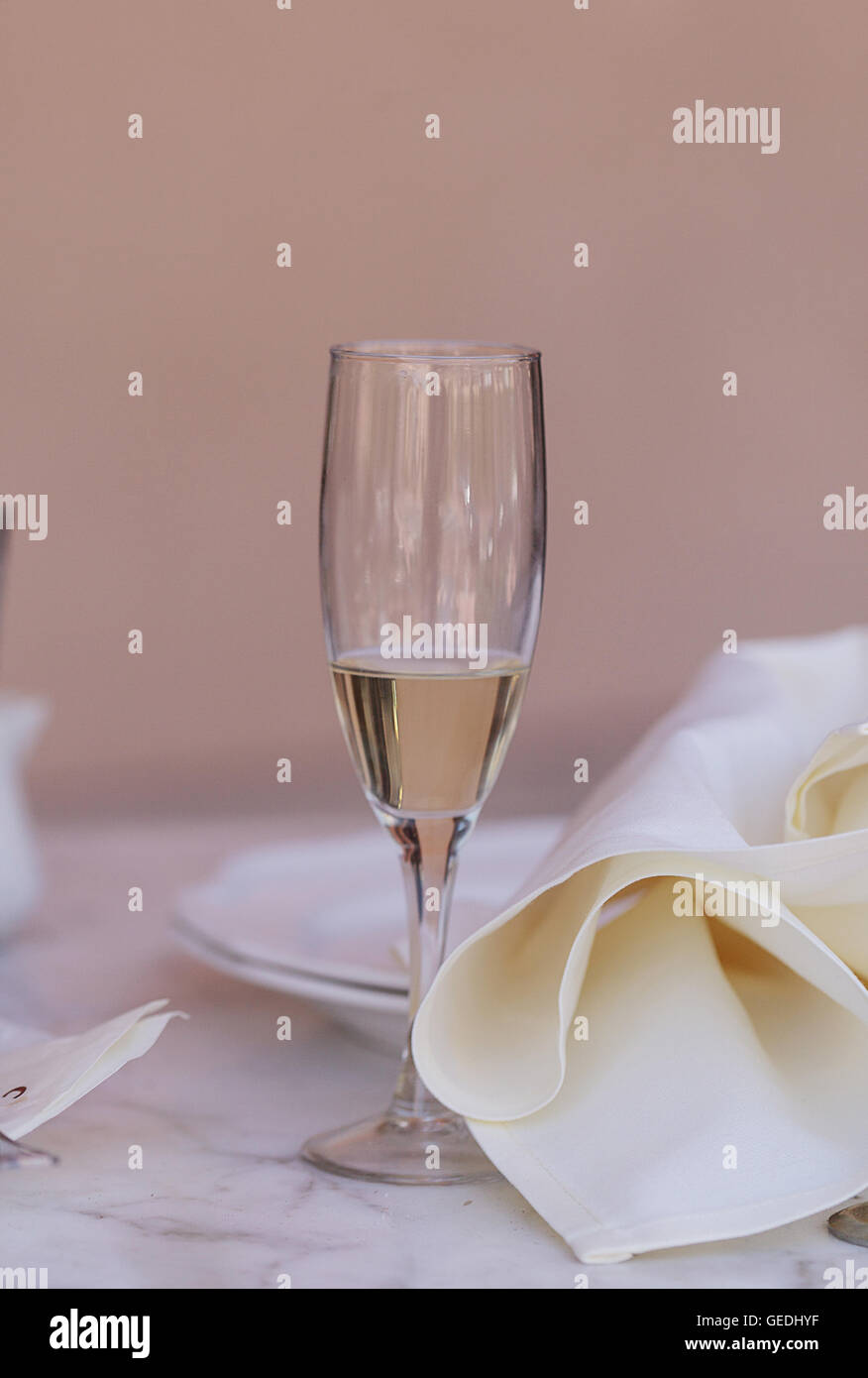 A place setting with a glass of champaign at an outdoor cafe restaurant in Southern California, United States. Stock Photo