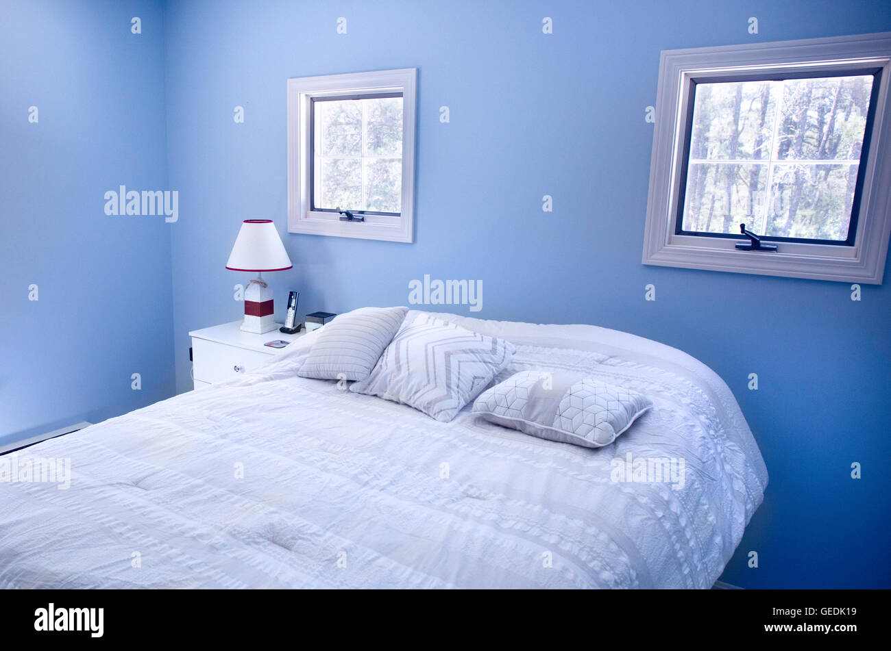 Bedroom With Blue Walls And Windows In Wellfleet Ma On Cape