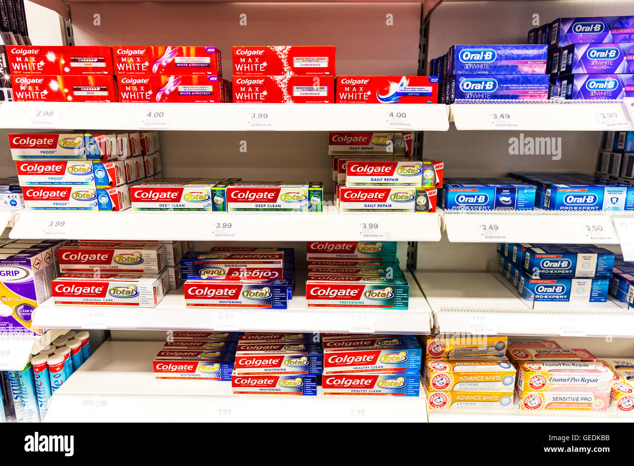 Colgate toothpaste boxes oral b toothpastes product products chemist shop  display types variations UK England GB Stock Photo - Alamy