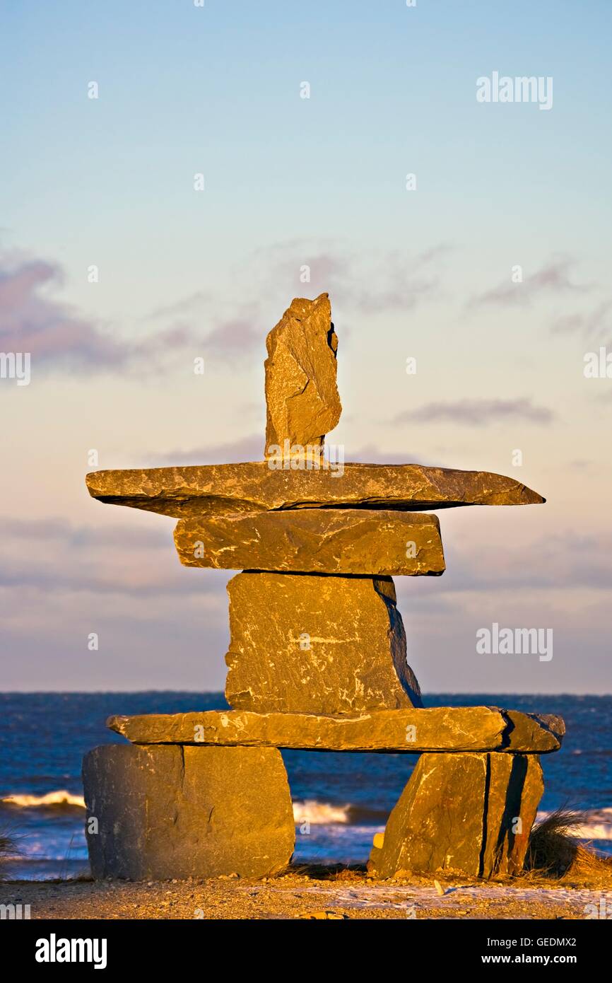 geography / travel, Canada, Manitoba, Churchill, Inukshuk at sunset in the town of Churchill on the shores of Hudson Bay, Manitoba, Stock Photo