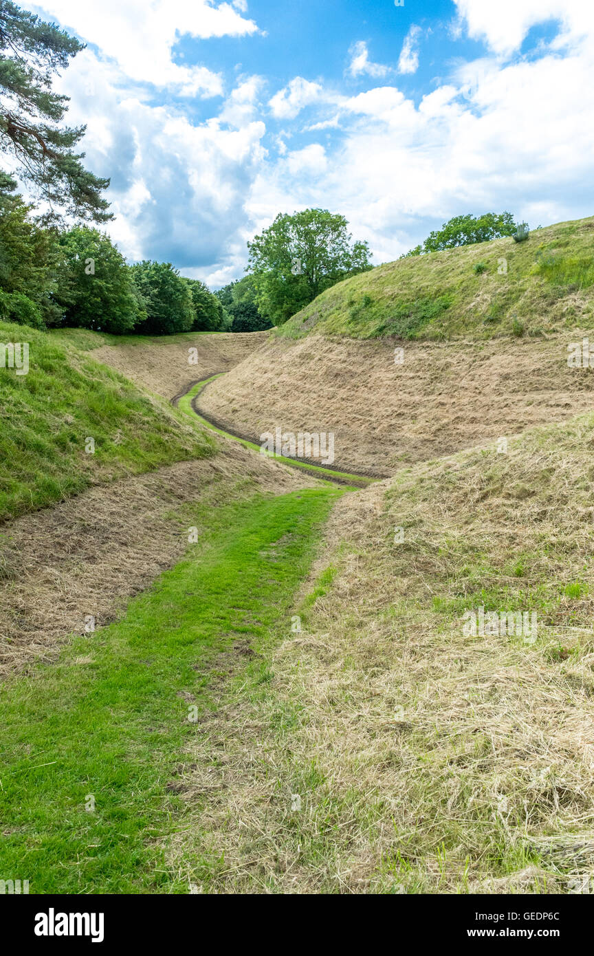 Hand dug moats at Castle Rising, Norfolk, England. Stock Photo