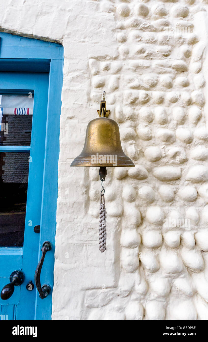 Hand operated brass ships bell used as a door bell Stock Photo Alamy