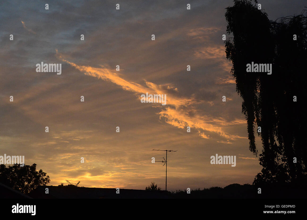 Yellow clouds after sunset Stock Photo