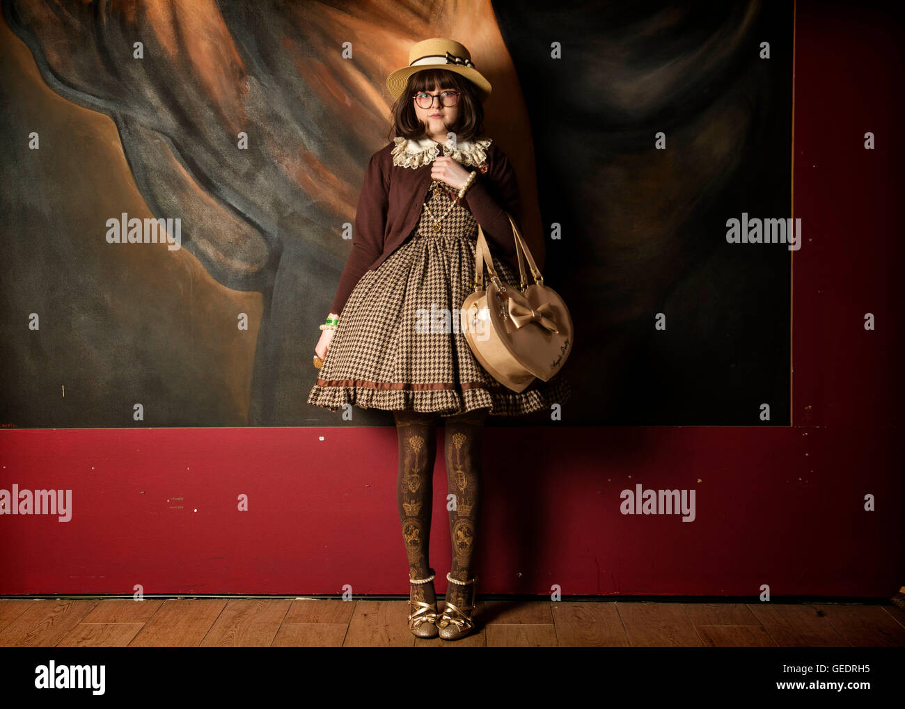 Teenager dressed in Japanese street fashion poses for photographs at a Comic Con convention. Stock Photo