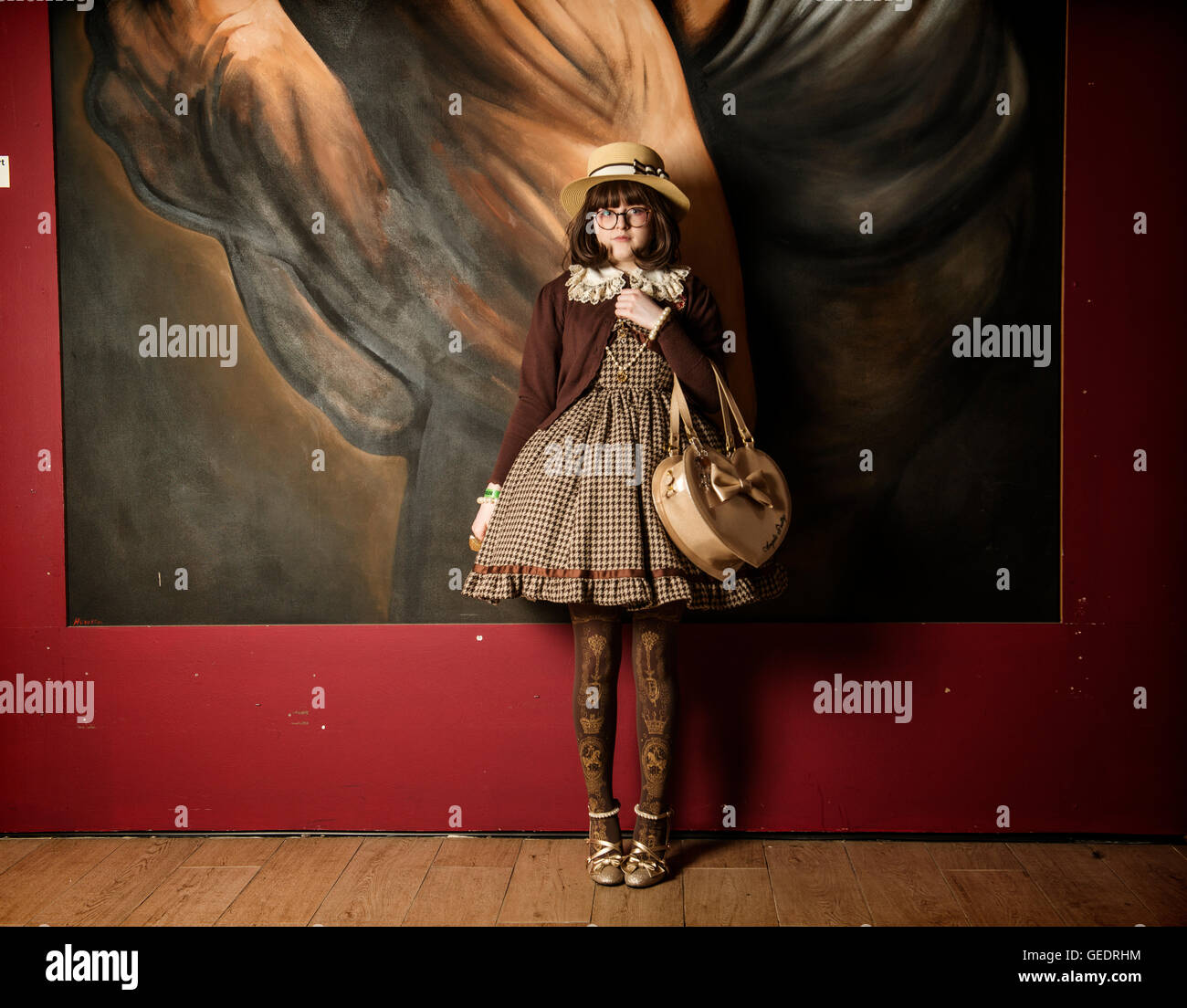 Teenager dressed in Japanese street fashion poses for photographs at a Comic Con convention. Stock Photo