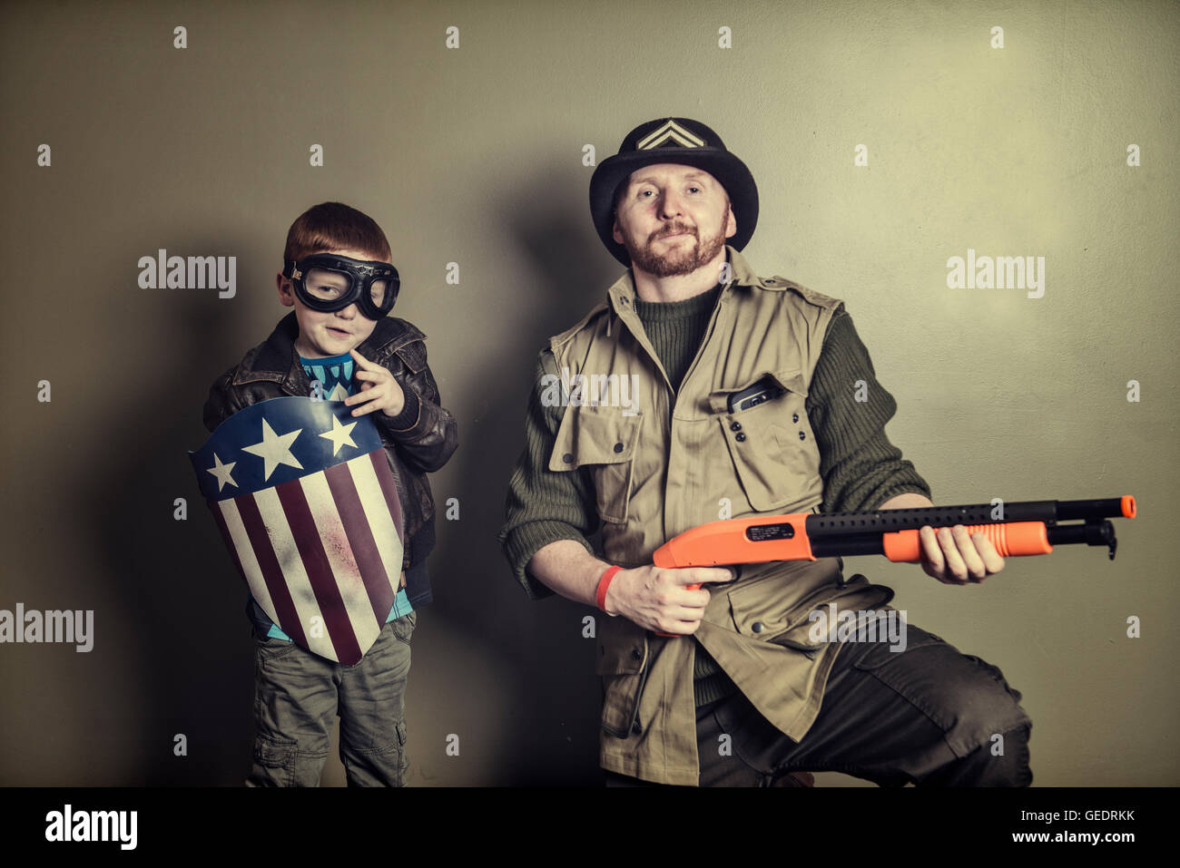 cosplayers father and son pose for photographs at a comic con convention GEDRKK