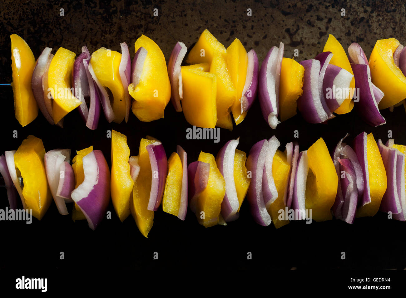 Yellow Peppers and Red Onions on Skewers Stock Photo