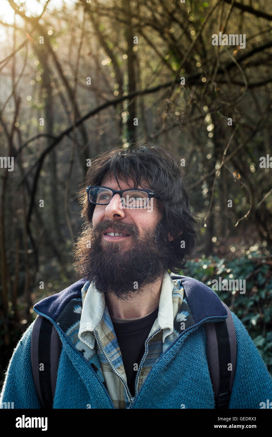 Portrait of Bearded Man Standing in Woods Stock Photo