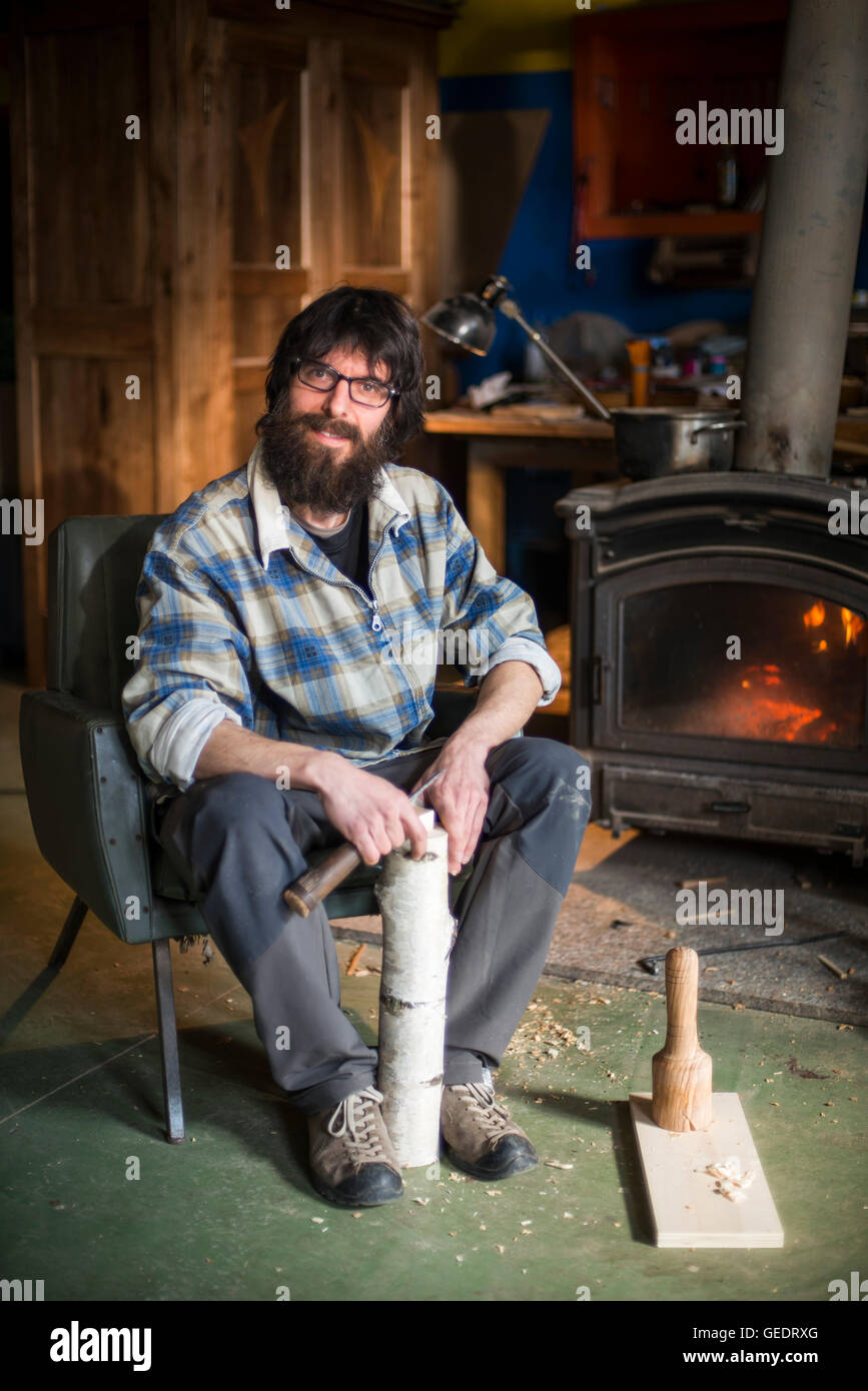 Portrait of Woodworker Sitting in Chair Stock Photo
