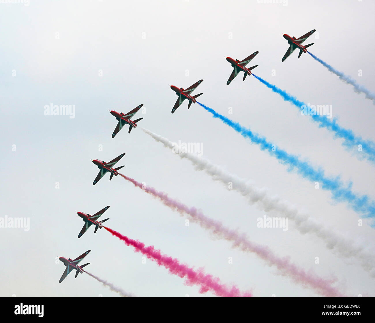 Red Arrows shoot past. Scotland's Airshow Stock Photo